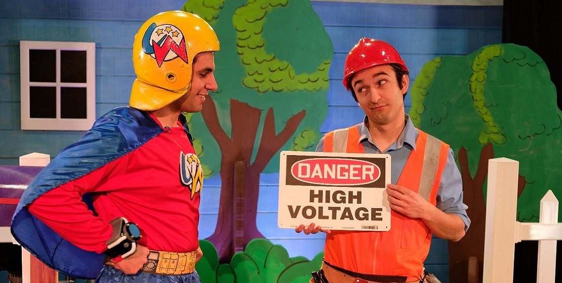 Captain Wattage and Lineman Larry with high voltage warning sign