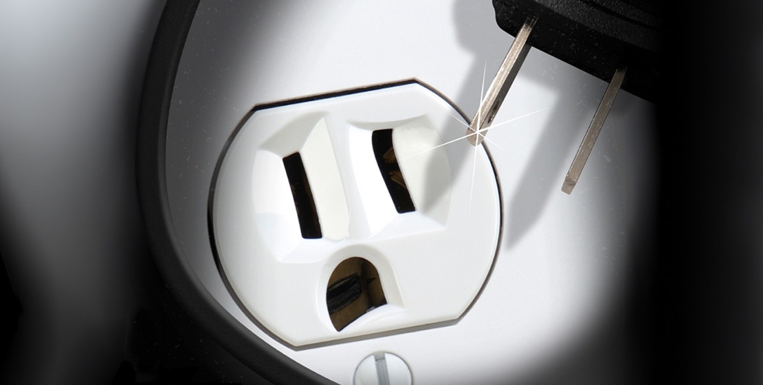 electric outlet with animated expression