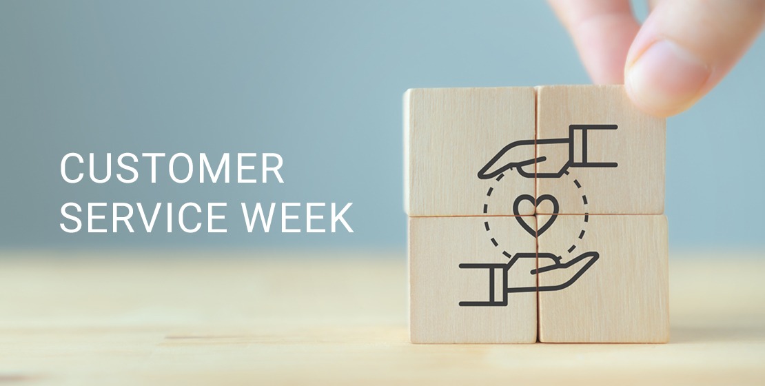 Businessman pressing smiley face emoticon on virtual touch screen. Customer service evaluation concept.