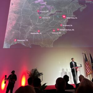 A photo of Eli Lilly CEO David Ricks speaking at the announcement.