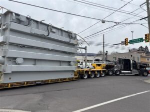 A photo of a transformer being delivered through downtown Dickson City.