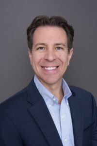 A headshot of Jason Hunt.