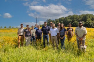 A team photo of organizations involved in bringing the meadow to life.