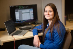 Young woman sitting at desk